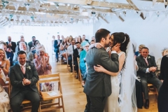 Amy and Kieran  embracing as husband and wfe