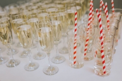 Glasses of bubbles and elderflower fizz set  up ready for guests leaving the ceremony